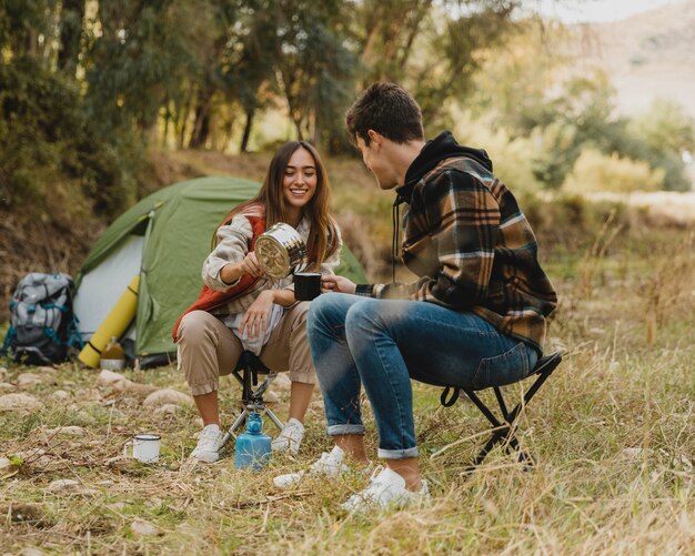 Happy couple in the forest being together