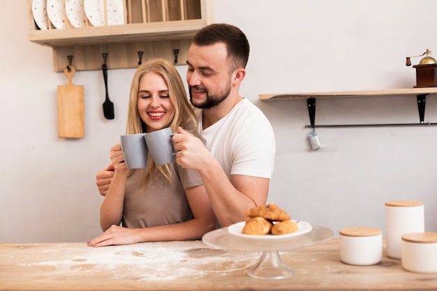 Happy couple having a breakfast