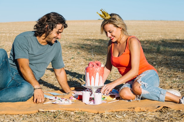 Happy couple having picnic