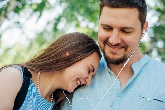 Happy couple listening to music 