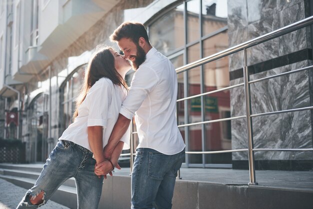 Happy couple in love on the street.