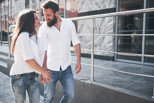 Happy couple in love on the street.