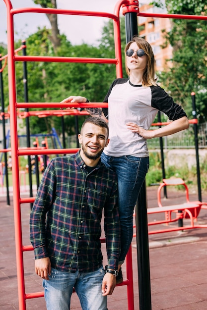 Free photo happy couple posing in the park