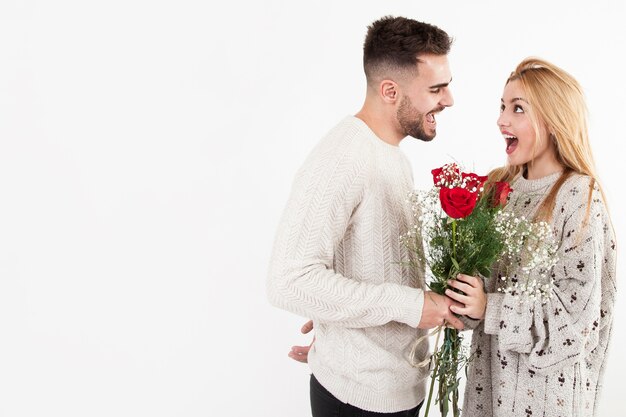 Happy couple with beautiful bouquet