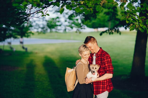 happy couple with dog