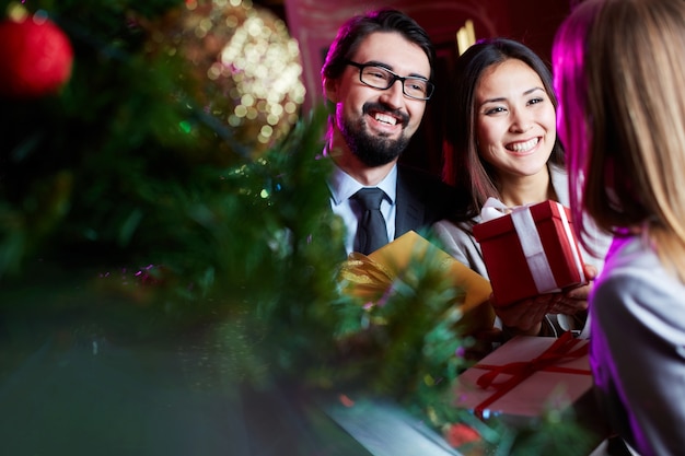 Happy couple with gifts