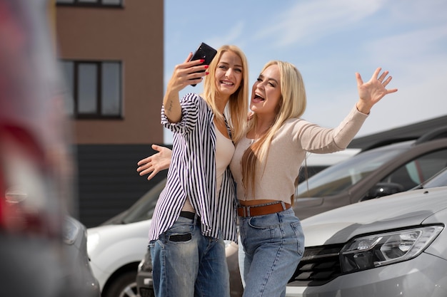 Happy customers in car dealership