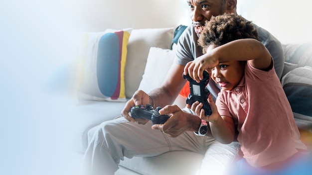 Happy dad and son playing together