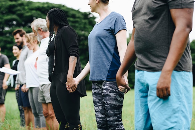 Free photo happy diverse people enjoying in the park