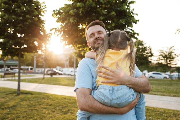 happy family father and daughter in the park