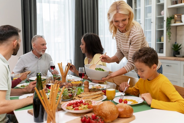 Happy family havinf dinner together