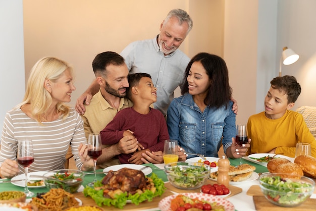 Happy family havinf dinner together