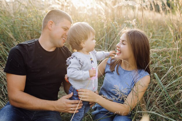 Happy family outdoors spending time together