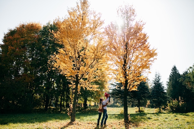 Free photo happy family play in forest