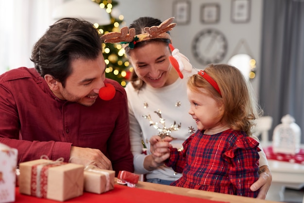 Happy family spending Christmas together at home