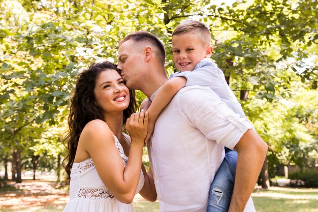 Happy family spending time in the park 