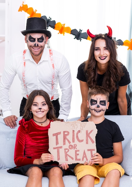 Free photo happy family together posing for halloween