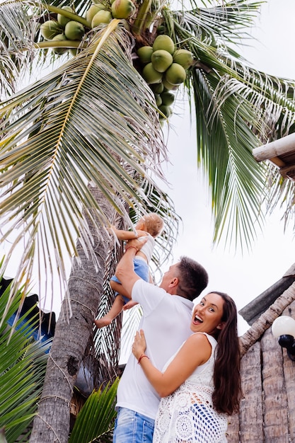 Happy family on vacation with little baby boy