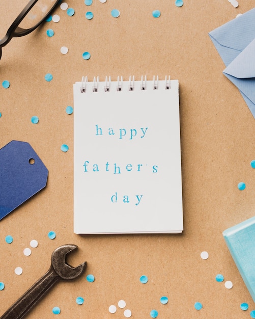 Free photo happy fathers day message on notebook