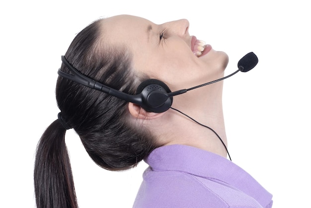 Happy female telephonist with headset and laughing smile