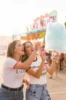 Free photo happy friends in the amusement park