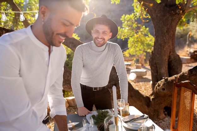 Free Photo happy friends having a new year party outdoors