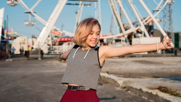 Happy girl at amusement park