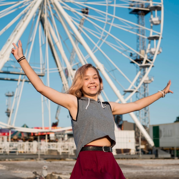 Happy girl at amusement park