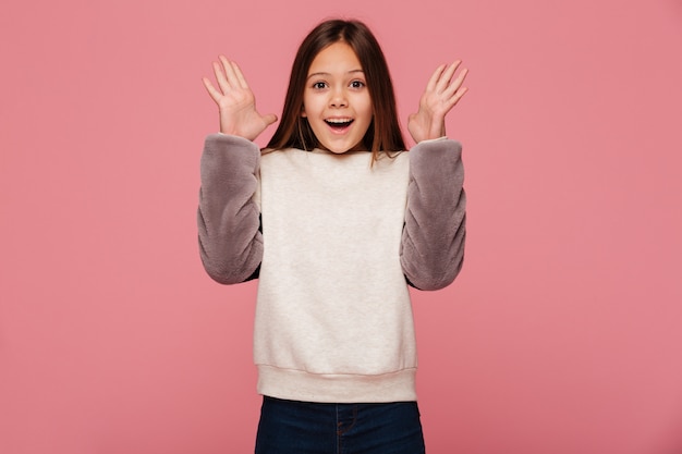 Happy girl looking and smiling isolated