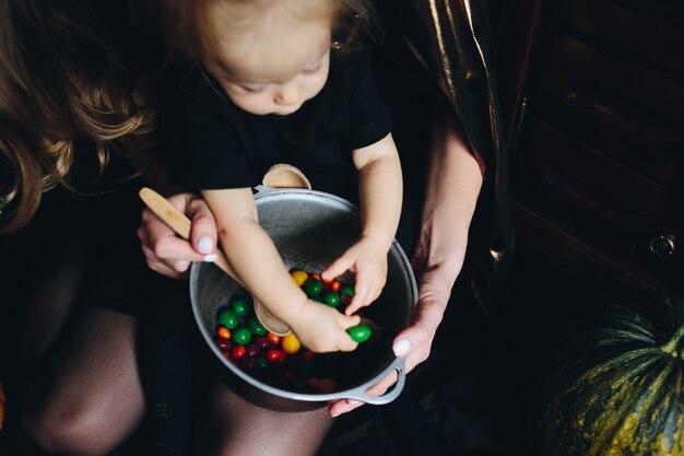 Free Photo happy girl playing with colorful candies