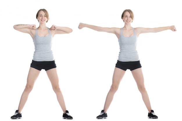 Happy girl showing two exercises for arms