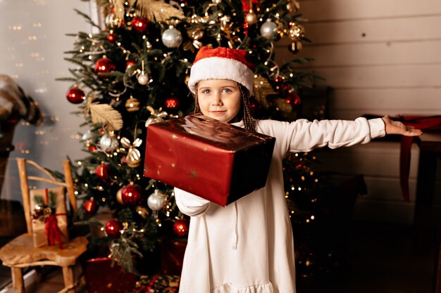 happy girl with christmas present