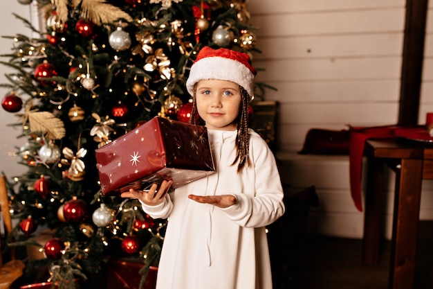 happy girl with christmas present