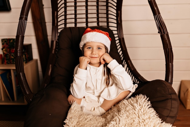 Free photo happy girl with christmas present