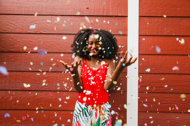 Happy girl with confetti