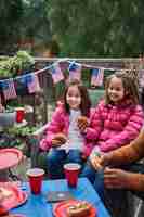 Free photo happy girls 4th of july celebration