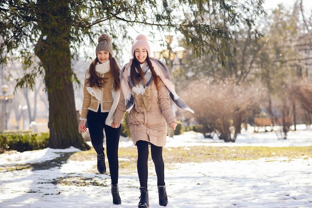 Happy girls in a winter city