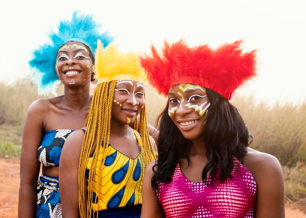 Happy group of friends at african carnival