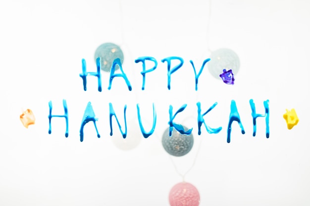 Happy Hanukkah writing and baubles