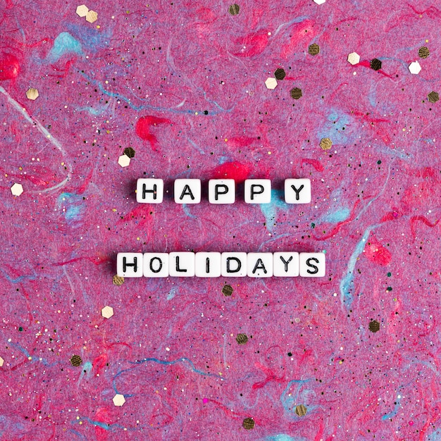 Free Photo happy holidays beads text typography