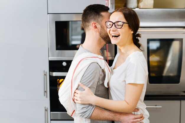 Happy hug in the kitchen