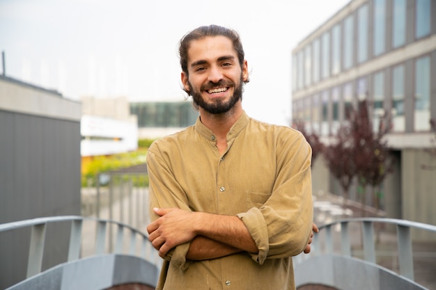 Happy joyful hipster guy posing