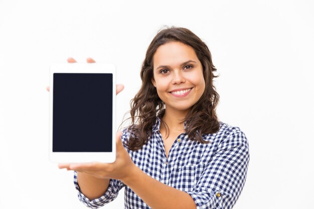 Happy joyful tablet user presenting new internet app