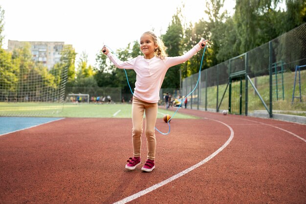 Happy kid playing outdoors