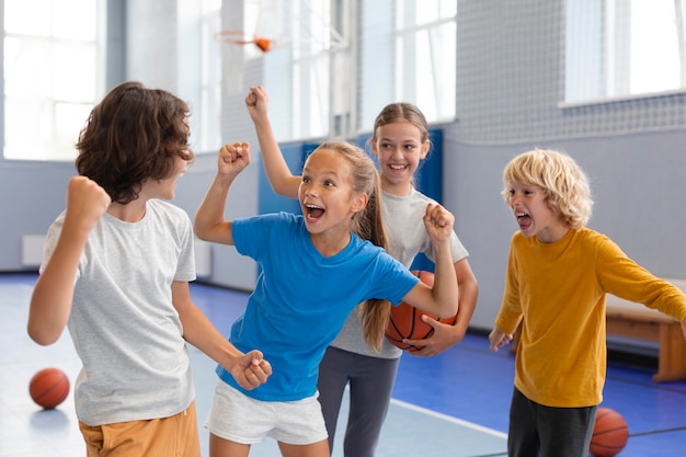 Happy kids enjoying their gym class