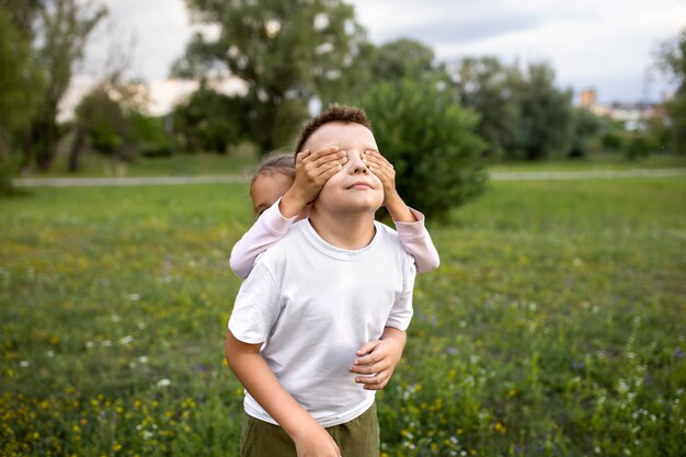 Happy kids playing outdoors