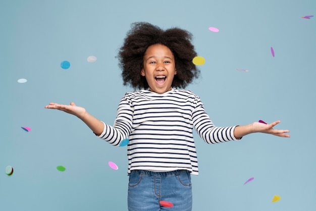 Happy little girl celebrating her birthday