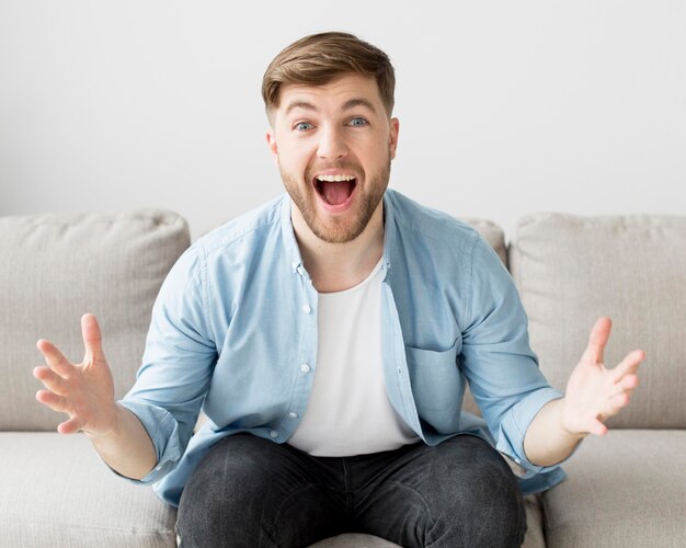 Happy man on couch