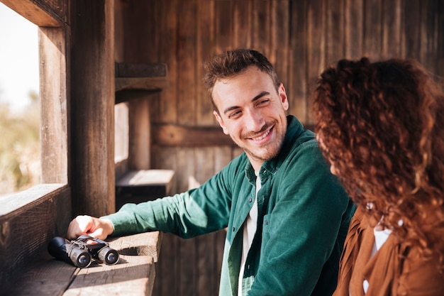 Happy man looking at his girlfriend