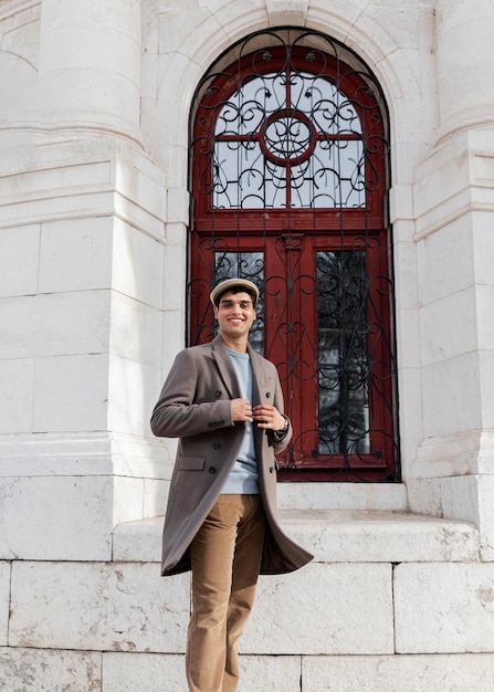 Happy man posing outdoors